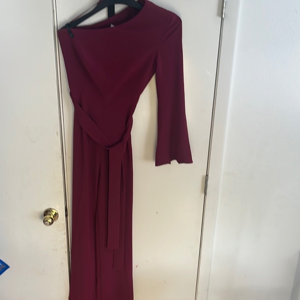 Adolfo Domínguez one shoulder burgundy jumpsuit with shawl.
